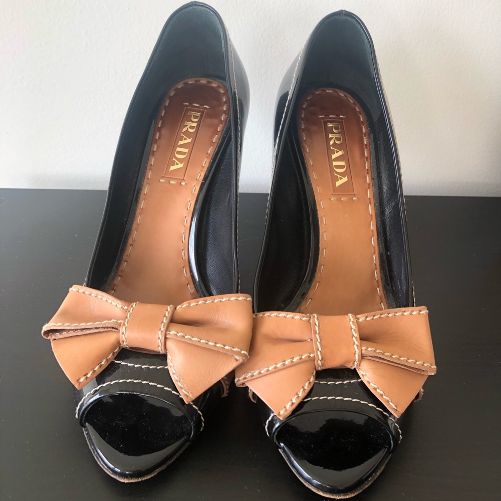 Prada black patent heels with tan bow